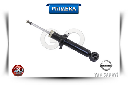 Siyah amortisör; metal piston kolu ve altta burç bağlantısı (PRIMERA, Nissan)